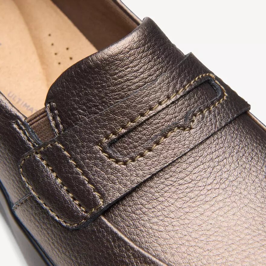 Γυναικεία Slip-ons Ellowyn Penny σε μεταλλικό χρώμα μπρούντζου Γυναικεία Slip-ons Ellowyn Penny σε μεταλλικό χρώμα μπρούντζου